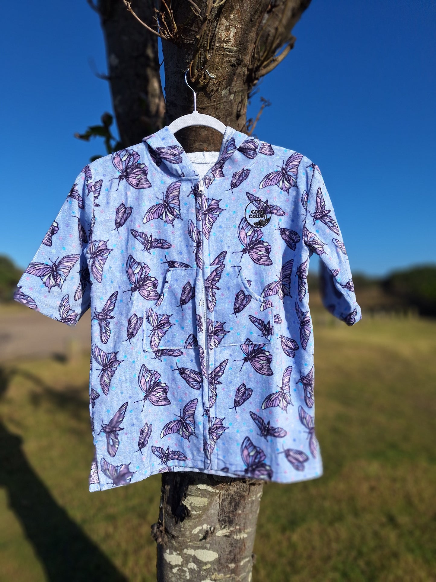 Zip-up wearable towel jacket for kids – swim and surf essential.