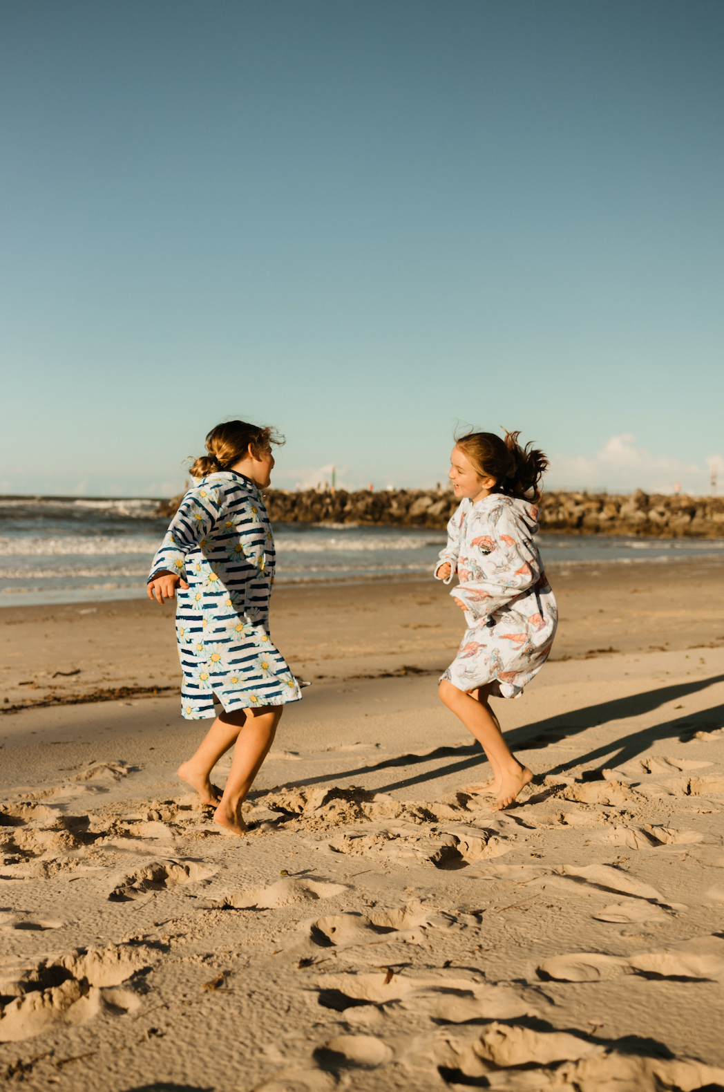 Australian-designed kids wearable towel – coastal style in 100% cotton.