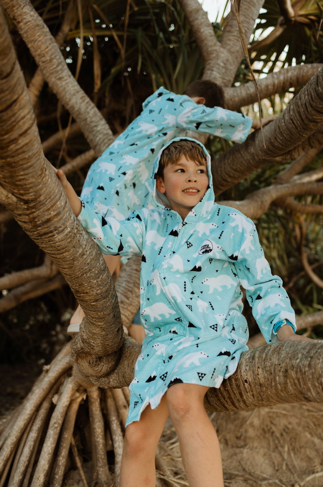 Australian-designed kids wearable towel – coastal style in 100% cotton.