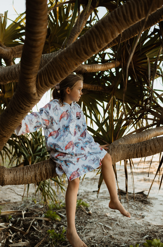 Australian-designed kids wearable towel – coastal style in 100% cotton.